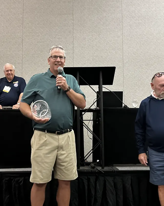 An awards presentation on stage at NCAEC 2026