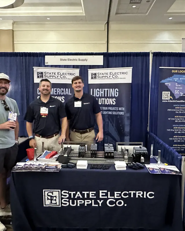 An exhibitor booth staffed at NCAEC 2026