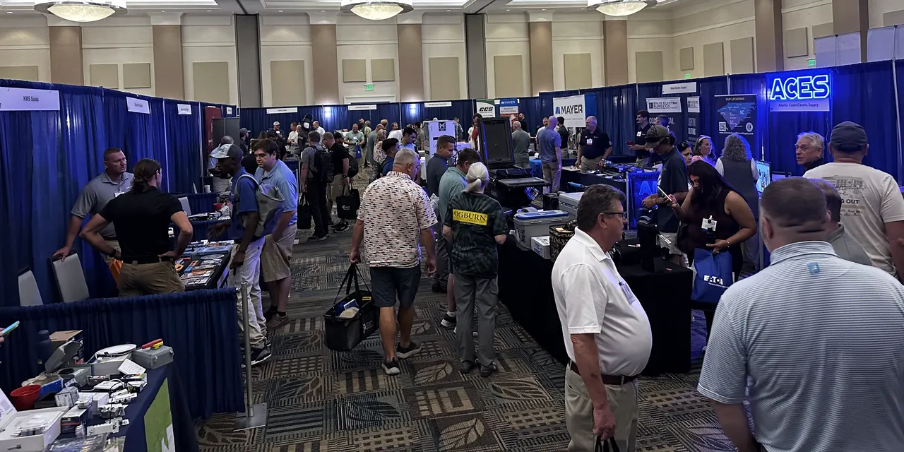Attendees and exhibitors on the NCAEC show floor